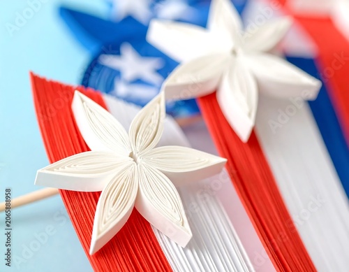 American flag wrapped around white gift box with ribbon.
