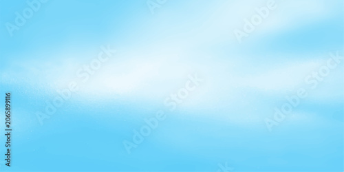 Bild auf Leinwand A serene expanse of bright blue sky, softly blurred with wispy white clouds, evokes a sense of peace and boundless possibility