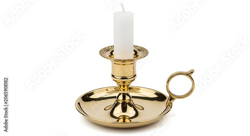 A brass candle holder with a white candle on a plain background