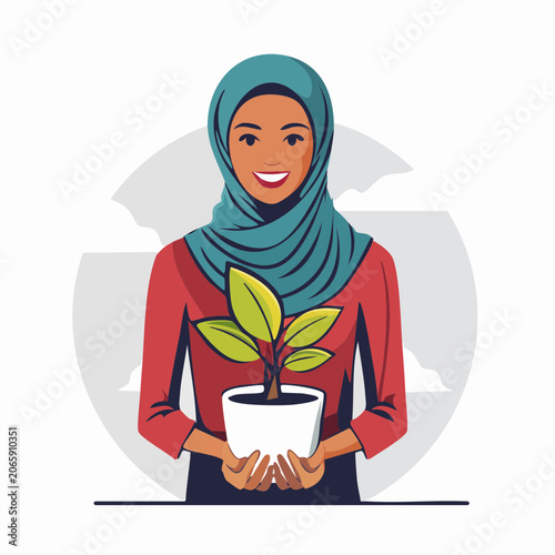 Woman in Hijab Holding a Potted Plant