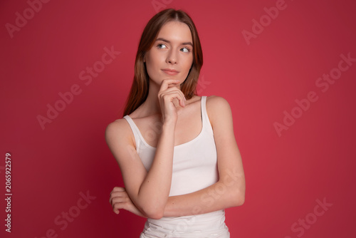 Thoughtful woman planning summer vacation