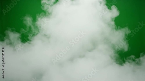 Dense green smoke swirls against a vibrant background creating an abstract and mysterious atmospheric effect.