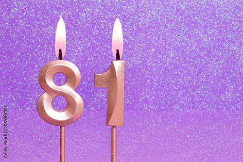 Number 81 on a pink background with blurred bright dots - Birthday or anniversary card with abstract blurred dots that glow