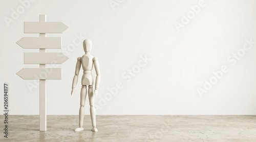 Mid-year performance review and career path decision concept with wooden mannequin standing by blank directional arrow signs and ample copy space for human resources presentation banner