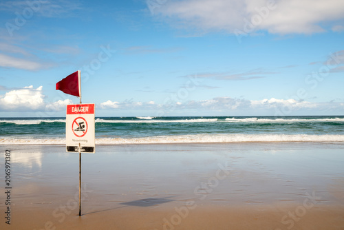 Danger No Swimming Sign at Surfers Paradise Beach in Gold Coast, Australia