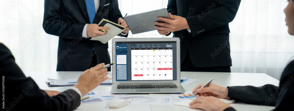 Fototapeta premium Calendar on computer software application for brisk schedule planning for personal organizer and online business