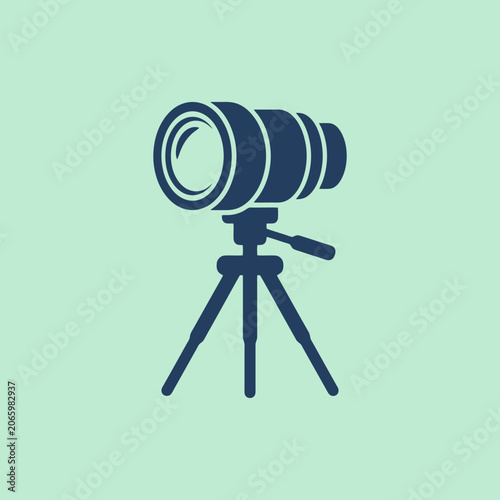 A dark blue camera lens icon sits on a tripod stand