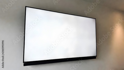 Large Flat Screen Television with Blank White Display for Advertising, Marketing and Digital Presentations. High-quality professional photograph featuring a modern large-screen television 