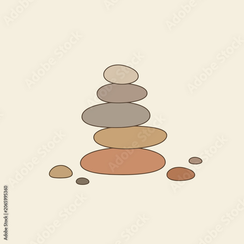 Photography A stack of smooth balanced stones on a light neutral background