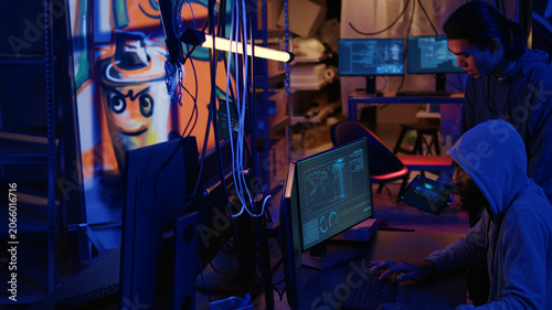 Konstfotografi Spies in secret hideout trying to steal valuable data by hacking governmental websites but getting their attacks rejected by strong security, espionage experts unable to gain access to sensitive info