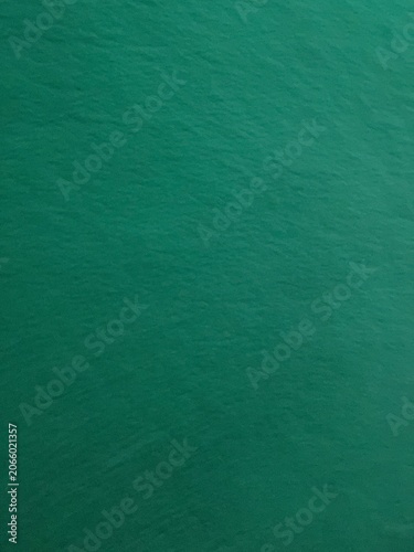 Textured Emerald Green Matte Paper Surface Background