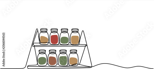 Single line of a spice rack with eight bottles containing red green and brown liquids on a white