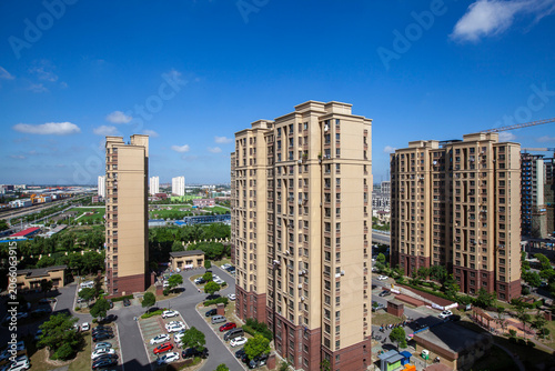 Canvas Print Modern High-Rise Residential Buildings under Blue Sky in Shanghai, China (Built