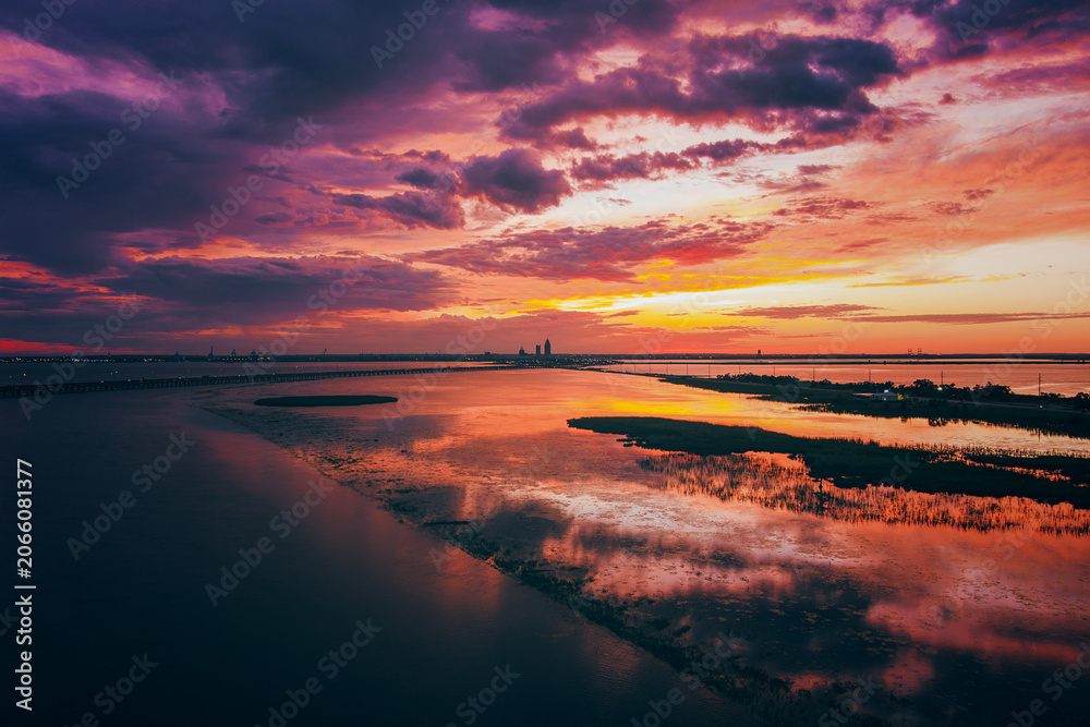 Fototapeta premium Aerial view of Mobile Bay at sunset