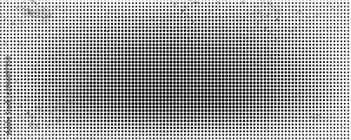 Abstract black and white ink swirls in water creating marbled texture pattern