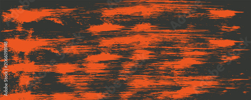 Dark gray background with distressed orange scratches and speckles abstract texture pattern grunge