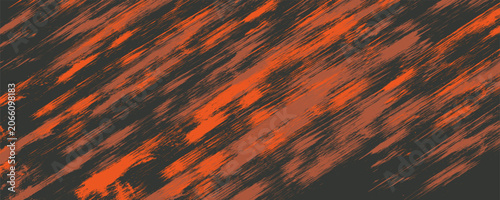 Dark gray background with distressed orange scratches and speckles abstract texture pattern grunge