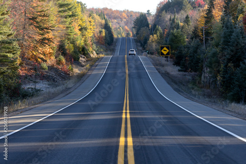 Konstfotografi Hilly scenic autumn highway in Algonquin Provincial Park Ontario Canada with moo