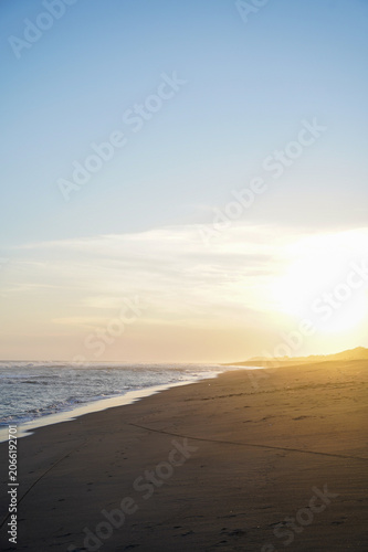 Golden Sunset Over Quiet Beach