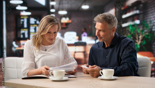 Foto Two People Review A Sealed Confidential Report About Corporate