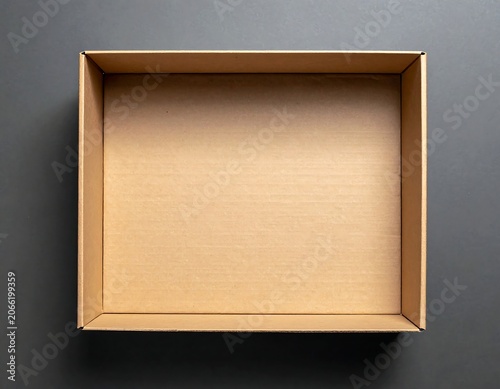 A brown cardboard box with a rectangular shape and folded edges