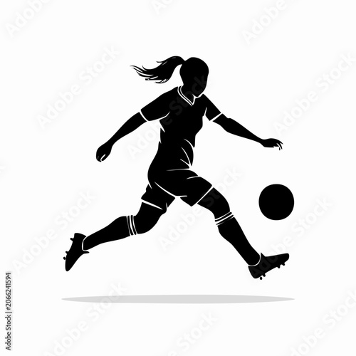 Dynamic silhouette of a female soccer player kicking the ball.