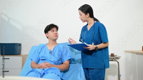 atient reviewing and signing medical consent documents with healthcare staff during hospital registration, consultation, treatment preparation