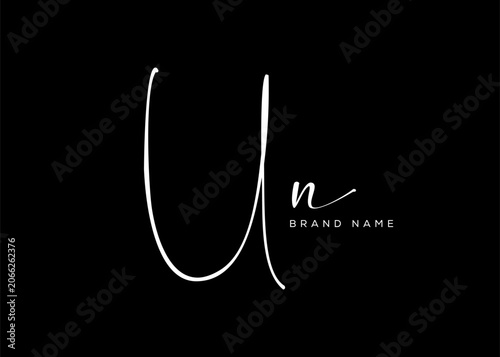 UN letter beauty cursive handwriting logo. vector logo| abstract logo| minimalist logo| brand identity| calligraphy design.