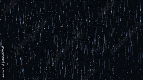 Photos Close-up view of heavy rain falling against a dark background, creating a dynamic and atmospheric visual effect