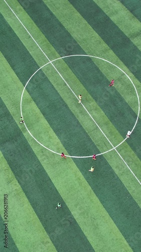 People Playing Football on the Field