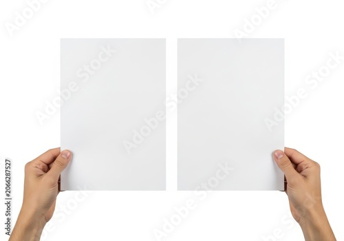 Hands holding and unfolding blank white paper sheet