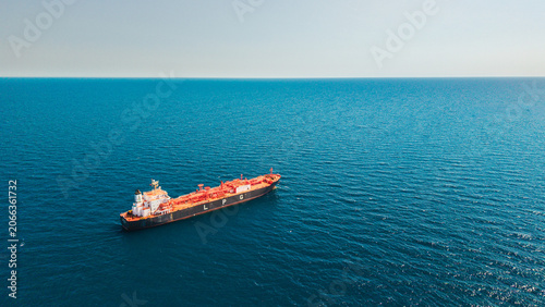 Aerial view of LPG tanker vessel sailing across open Mediterranean Sea with vast blue water and copy space