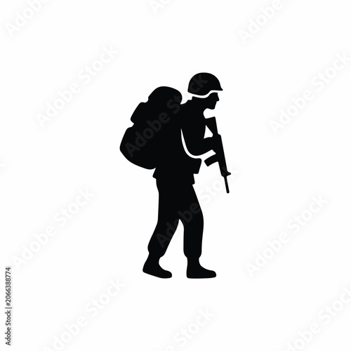 Silhouette of a soldier in uniform carrying a backpack and rifle, walking