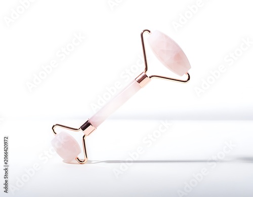Rose Quartz Facial Roller Isolated on White Background