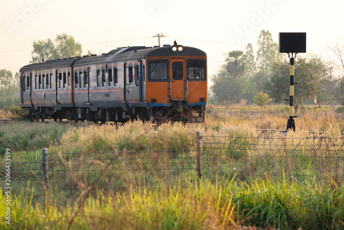 Train on the railway in the countryside of Thailand