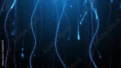 Abstract blue glowing particle trails falling against a dark background