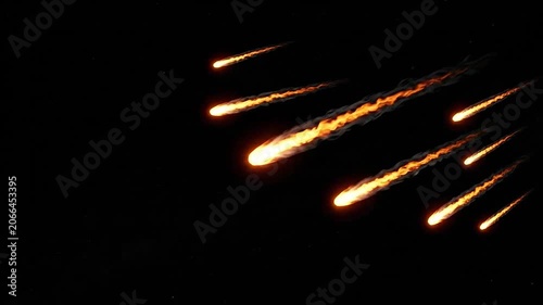 A group of glowing meteors streaks across the dark night sky with fiery trails