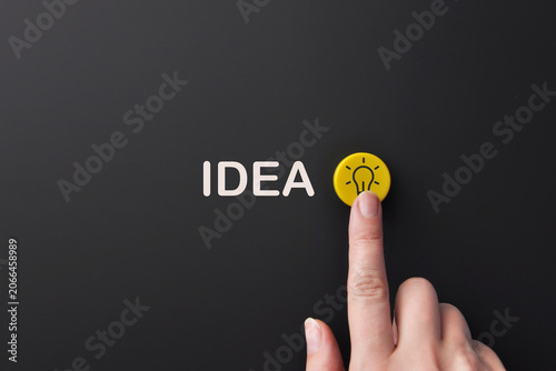 Fotografie Creative idea concept with light bulb button and innovation message