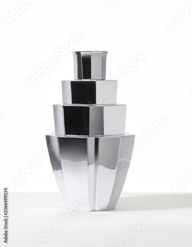 Chrome stepped art deco decorative object on white