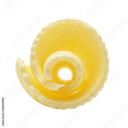 A single, meticulously crafted pale yellow butter curl with sharp ridges, isolated against a brilliant transparent background with copy space, clean food photography aesthetic, concept of culinary