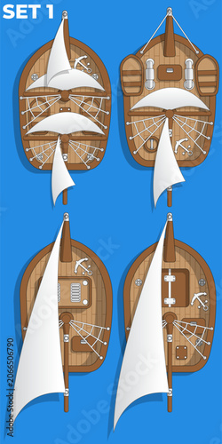 A set of sailing ships. View from above. Isolated on a blue background. Vector illustration.