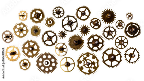 Tableau sur toile Isolated vintage antique brass clockwork gears and intricate wheel parts on disp
