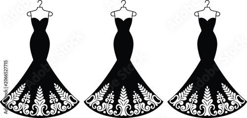 Fotografie Black evening gown silhouettes on hangers with elegant floral embroidery details