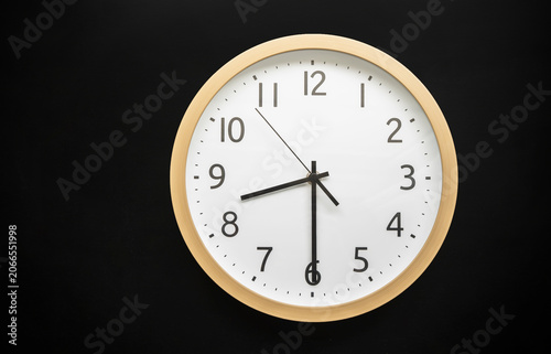 Wall clock showing 8:30