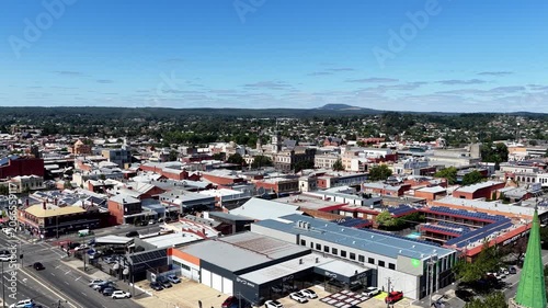 Up over streets and houses of Ballarat city of gold rush in Victoria, Australia – aerial cityscape.