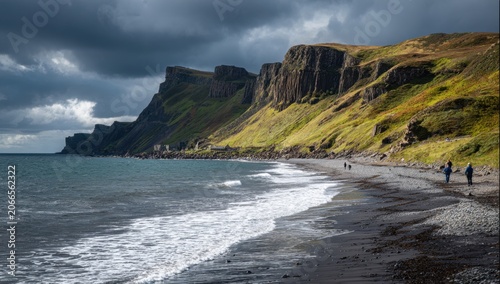 Dramatic Coastal Cliffs Overlooking a Black Sand Beach with Crashing Waves.