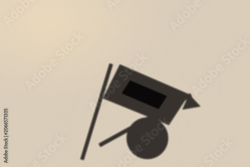 Illuminated Shadows of the City – Abstract Sign Shadow on Textured Wall