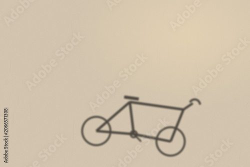 Illuminated Shadows of the City – Bike Shadow on Textured Wall