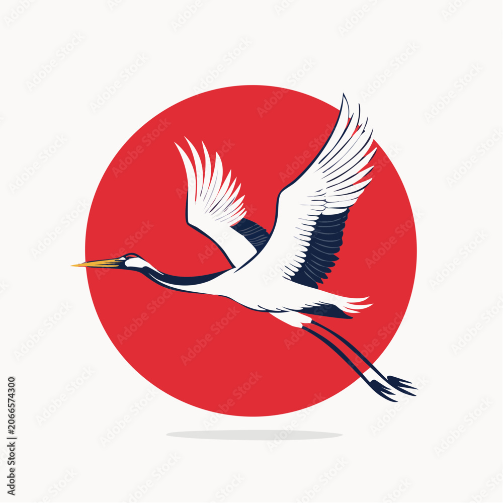 Fototapeta premium Japanese Crane Flying in Front of Red Sun