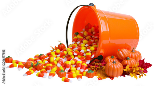 фотографія Orange Halloween bucket spilling candy corn and pumpkins